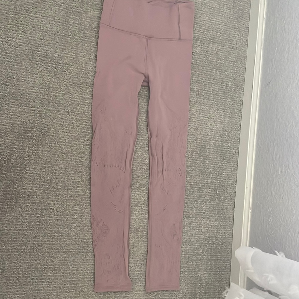RARE LULULEMON PANTS. Brand new condition and very stretchy. Lace detailing